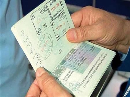 Original Spanish passport biometric page with chip and holograms